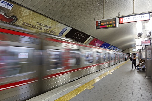 View of train at night in station, Chicago.