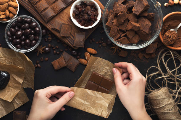 Assortment of handmade sweets and craft tools, top view