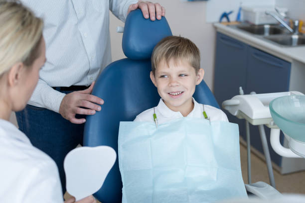 istock Brave Little Boy Visiting Dentist 958878896