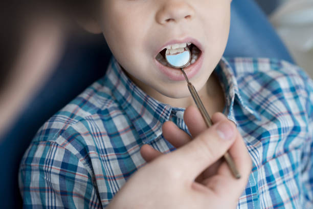 istock Child Visiting Dentist Closeup 958878958