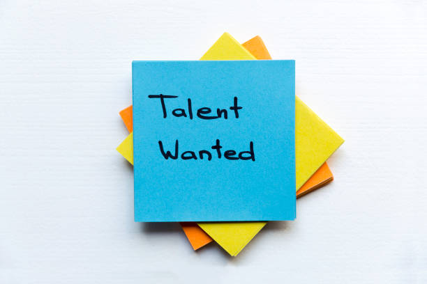 istock Talent Wanted, Business Concept. Sticky notes and words TALENT WANTED 958879524