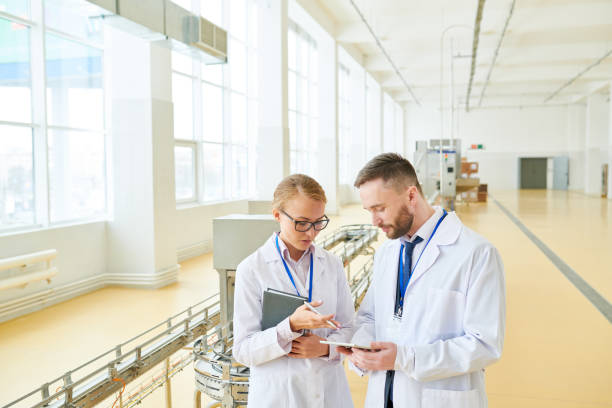 istock Inspectors at Packaging Department 958882462