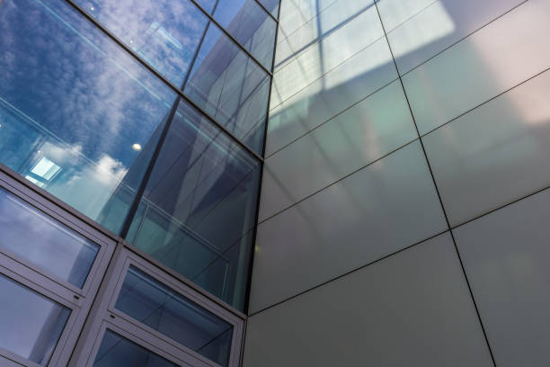 istock The glass architecture in city against a sky 958882724