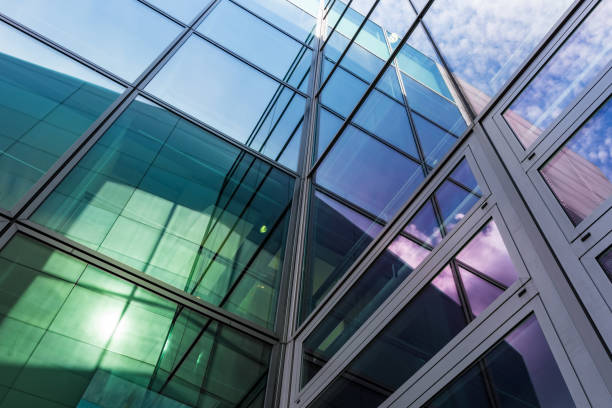 istock The glass architecture in city against a sky 958882836