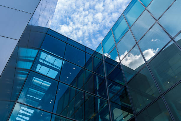 istock The glass architecture in city against a sky 958883052