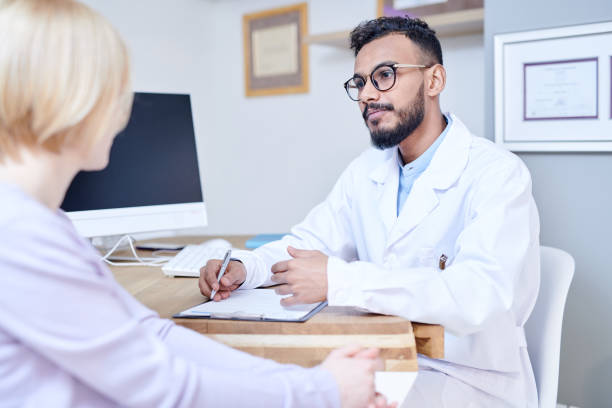 istock Middle-Eastern Doctor Talking to Patient 958883086