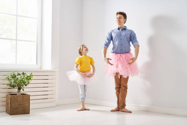 father and daughter playing Happy father's day! Dad and his daughter child girl are playing, smiling and dancing. Family holiday and togetherness. happy fathers day funny stock pictures, royalty-free photos & images