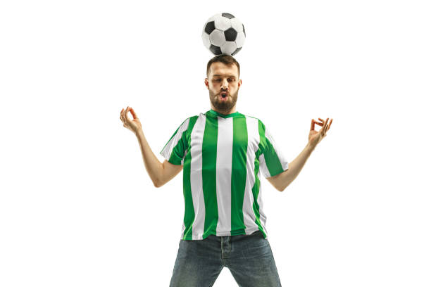 istock Irish fan celebrating on white background 958885934