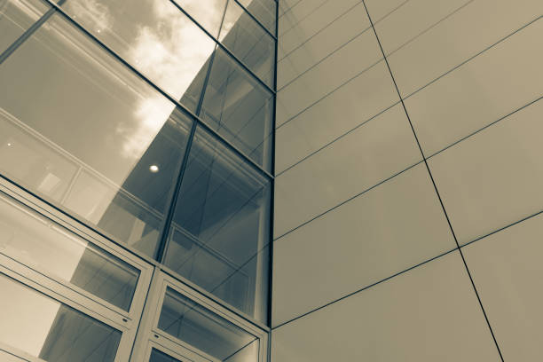 istock The glass architecture in city against a sky 958886896