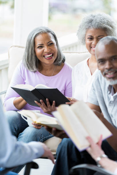 istock Seniors participate in book club 958888124