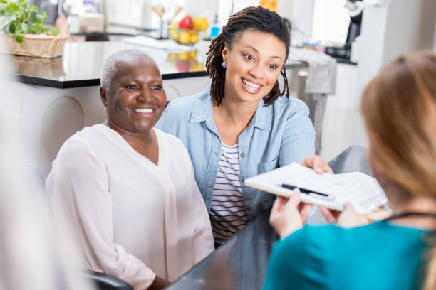 istock Home healthcare patient visits with nurse 958891716