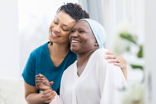 istock Mid adult woman visits her elderly mother 958891762
