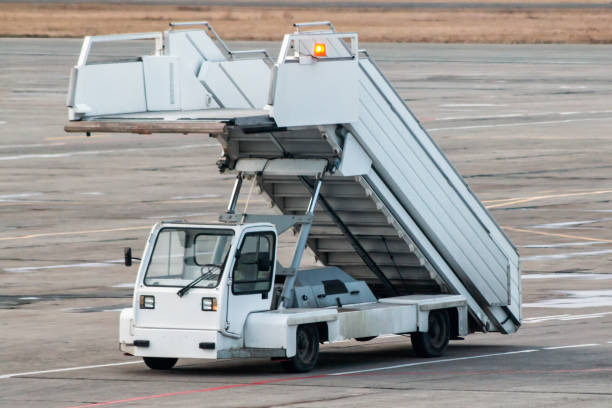 istock Passenger boarding steps at the airport apron 958892050