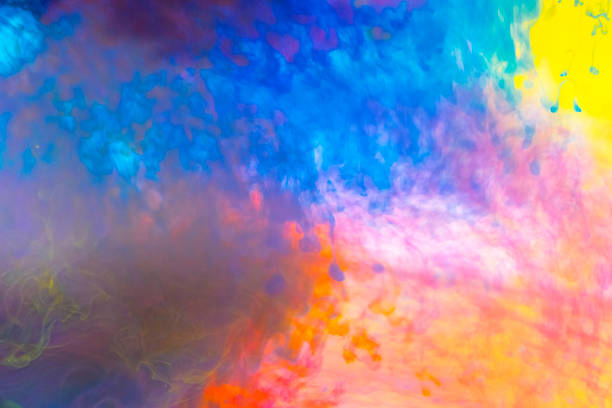 istock Acrylic colors and ink in water. Abstract frame background. Isolated on white. 958892434