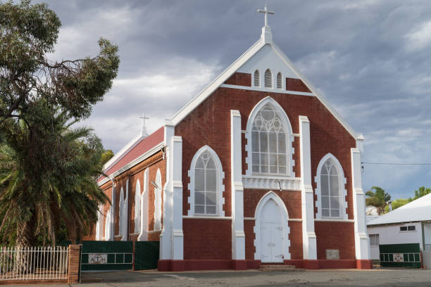 New Norcia,WA,Australia-July 15,2016: Cross detail and red brick architecture at St. Ildephonsus College for Boys in the historic monastic town of New Norcia, Western Australia.