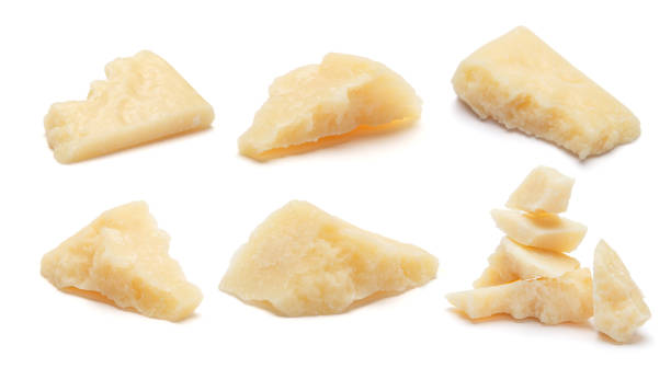 set of parmesan cheese pieces on white - parmesan cheese imagens e fotografias de stock
