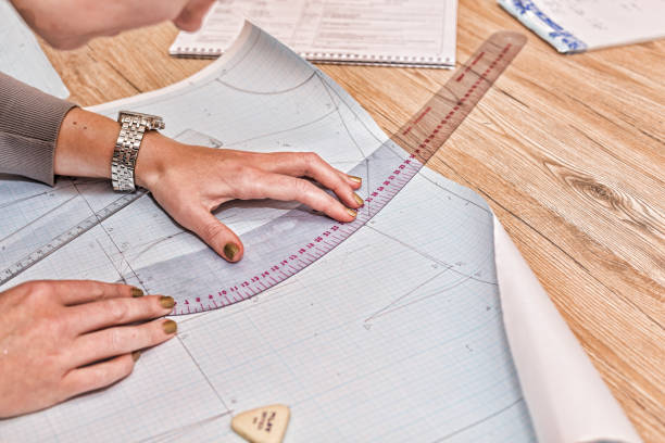 istock cloth, dressmaker, pattern, seamstress, sew, tailor, textile, woman, creative, designer, handicrafts, needle, fabric, fashion, 958895344