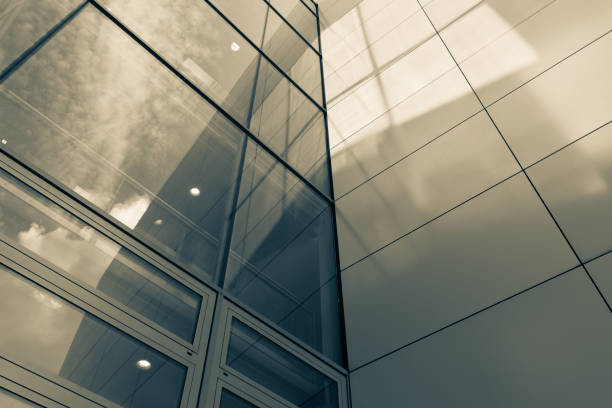 istock The glass architecture in city against a sky 958898946