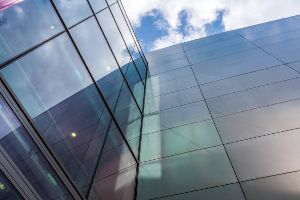 istock The glass architecture in city against a sky 958902936