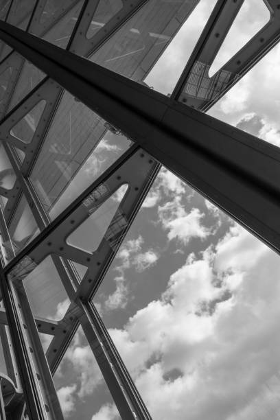 istock The glass architecture in city against a sky 958903408