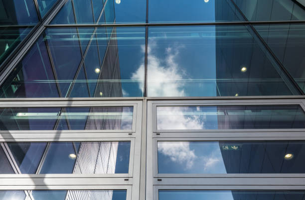 istock The glass architecture in city against a sky 958904124