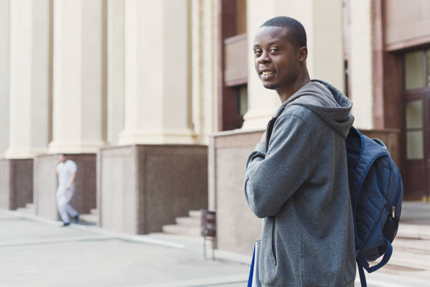 istock African-american student with bag at university 958909546