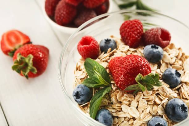 istock Healthy breakfast on white wooden table, closeup 958910130