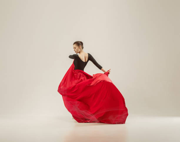 istock Modern ballet dancer dancing in full body on white studio background 958914298