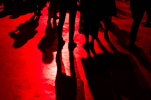 istock shadows of people on the floor 958915162