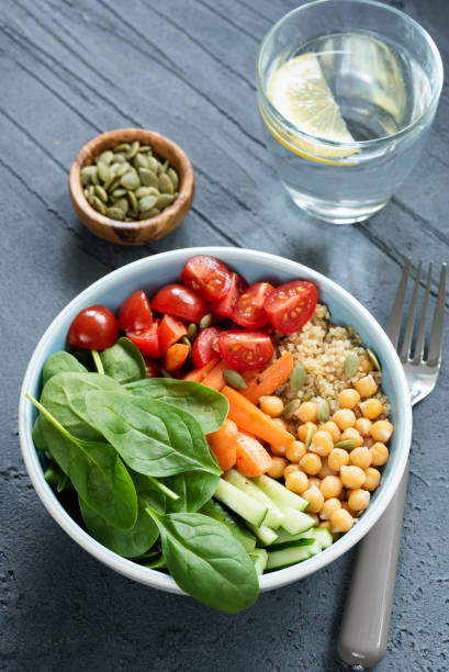 istock Chickpea salad bowl on concrete background 958918500