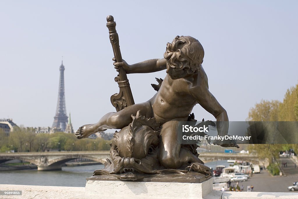 Paris cherub statue with eiffel tower in background  Angel Stock Photo