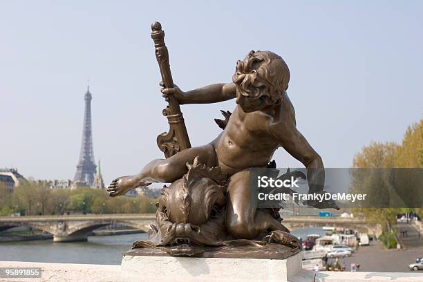 Paris Cherub Statue With Eiffel Tower In Background Stock Photo - Download Image Now