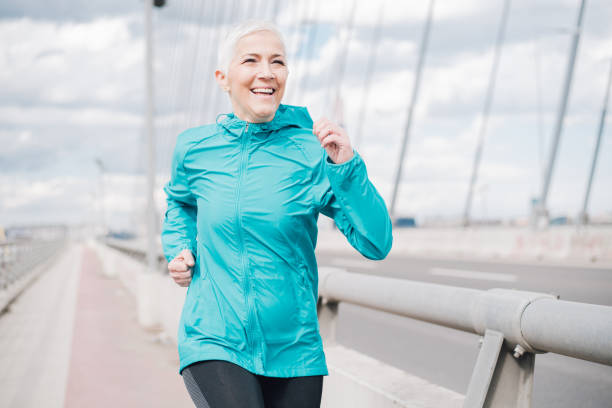 istock Mature woman running 958918638