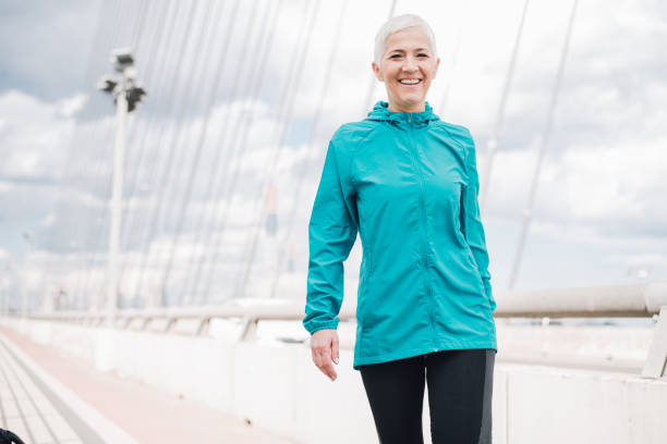 istock Happy female jogger 958918684