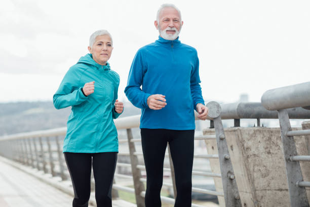 istock Handsome senior couple exercising outdoors 958919966