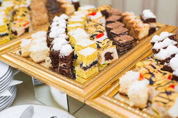 istock Delicious sweets on wedding candy buffet with desserts, cupcakes 958920140
