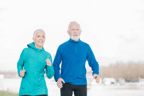 istock Senior couple exercising outdoors 958920260