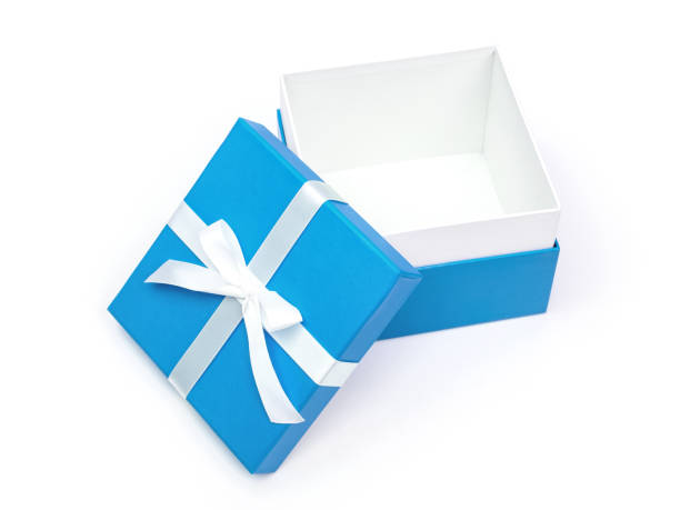 istock Blue gift box with ribbon isolated on white background. Clipping path 958923456
