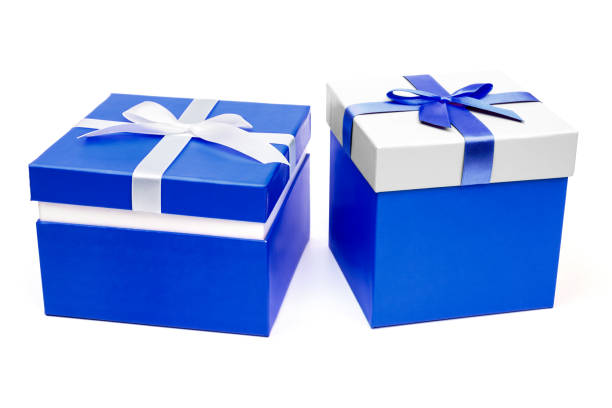 istock Two gift boxes with ribbon bow. Holiday present. Isolated on white background 958923586