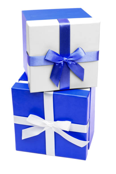 istock Two blue and white gift boxes with ribbon isolated on white background. Clipping path 958923594