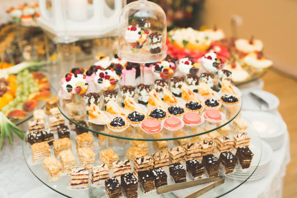 istock Different kinds of baked sweets on a buffet 958923660