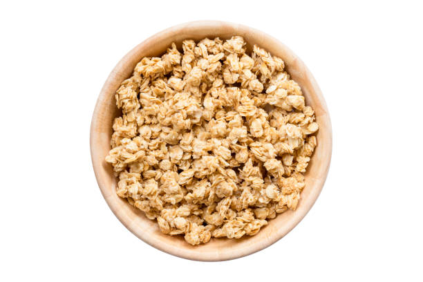 istock Close up top view granola in the bowl on isolated with clipping path. 958927934