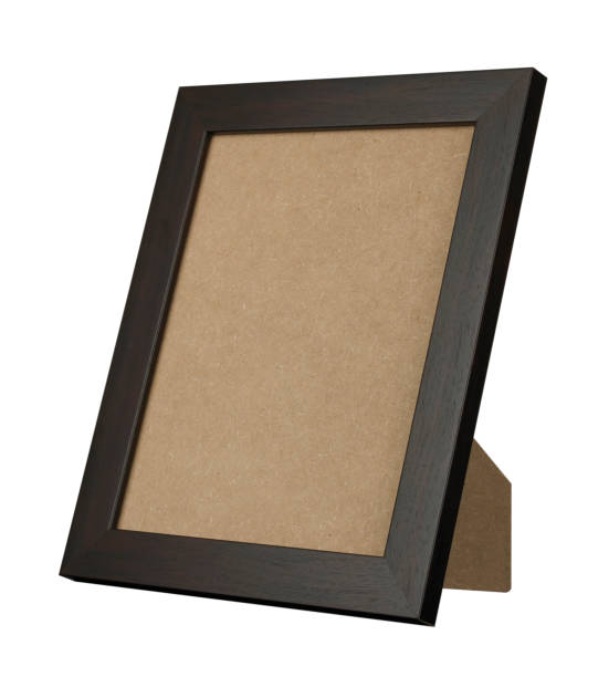 istock BLACK WOOD PICTURE FRAME ON WHITE BACKGROUND 958930336