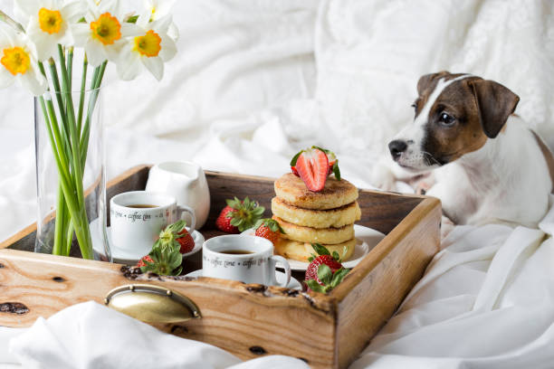 istock Breakfast in bed: cottage cheese pancakes, coffee and strawberries 958931164