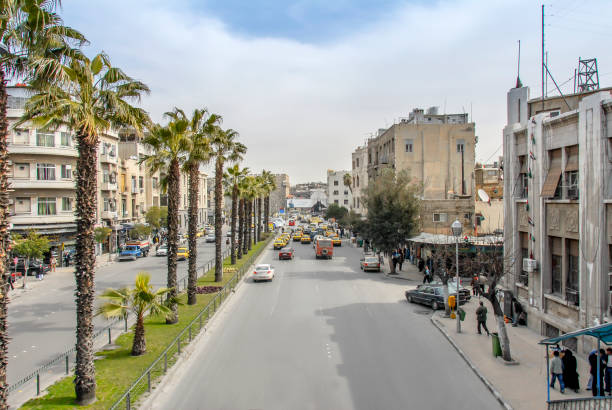 istock Sty Center, Palms and cars 958935234