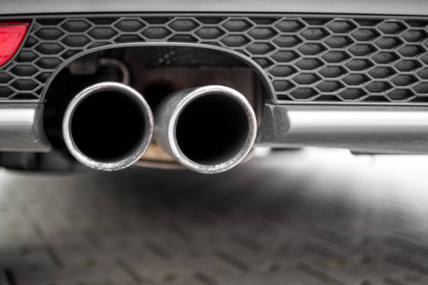 istock Car Exhaust Pipe Close Up 958935914