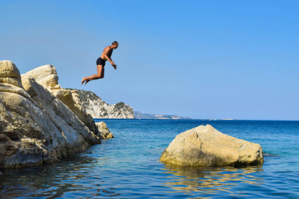istock Jump into the sea. 958937086