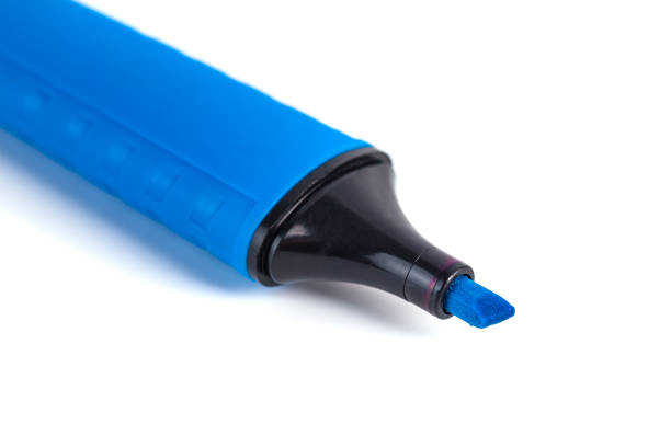 istock Blue marker and paper on a white background 958937306
