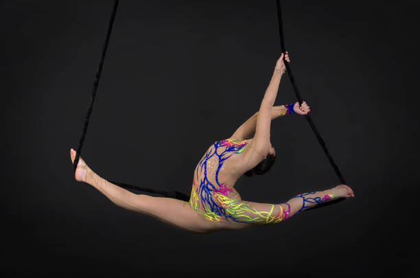istock Aerial acrobat in the trapeze 958946096