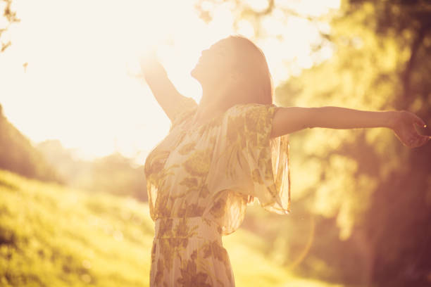 istock Nature make me happy. Beautiful young woman. 958946668